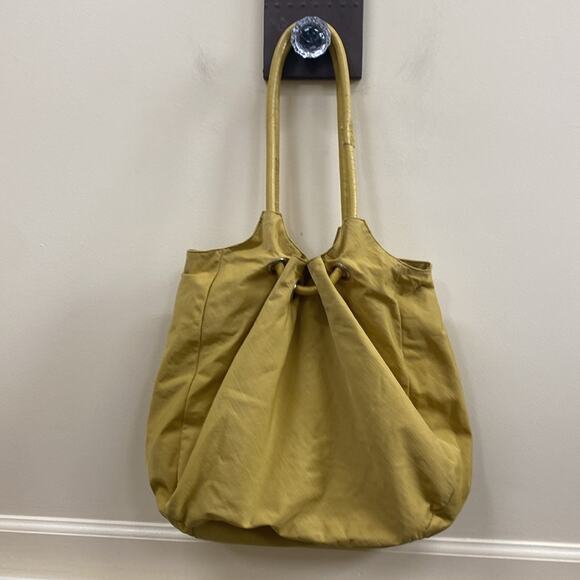 HOBO brand mustard color slouchy vinyl shoulder bag - Picture 1 of 6